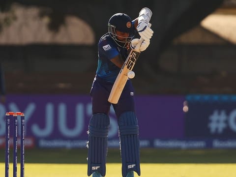 Pethum Nissanka of Sri Lanka plays a defensive shot during the ICC Cricket World Cup Qualifier against Scotland at Queen’s Sports Club in Bulawayo, Zimbabwe, on Tuesday.