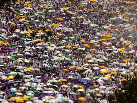Muslim pilgrims leave prayers outside Namira Mosque in Arafat on the second day of the annual Hajj pilgrimage near the holy city of Mecca, Saudi Arabia, Tuesday, June 27, 2023. 