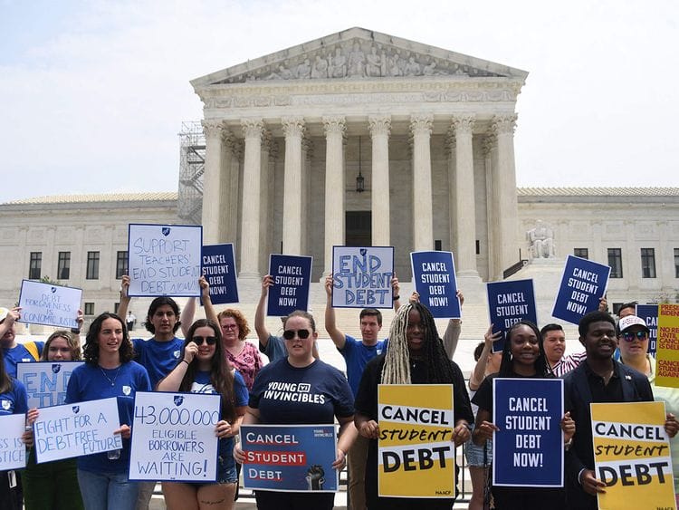 Supporters of student debt forgiveness demonstrate outside the US Supreme Court on June 30, 2023, in Washington, DC.  