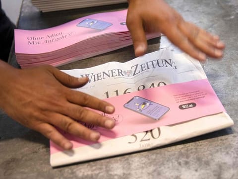 The last edition of the 'Wiener Zeitung', one of the world's oldest newspapers, has a banderole indicating the change to the online version of the newspaper, in Vienna on June 29, 2023. Founded in 1703, during the time of the Habsburg Empire, it has survived the turmoil of history, but after years of uncertainty, the print edition of the newspaper is finally going to disappear. 