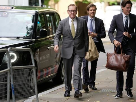 Actor Kevin Spacey arrives at Southwark Crown Court in London.