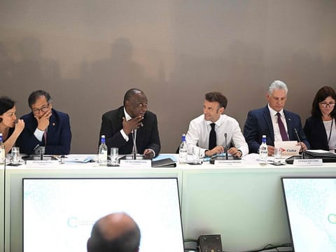 (From 2nd L) President of Colombia Gustavo Petro, South Africa's President Cyril Ramaphosa, French President Emmanuel Macron and Cuban Miguel Diaz-Canel attend a  working session with representatives of banks of the "Finance in Common" network during the New Global Financial Pact Summit at the Palais Brongniart in Paris on June 22, 2023. Dozens of global leaders are gathering in Paris on June 22 for a summit to tease out a new consensus on international economic reforms to help debt-burdened developing countries face a growing onslaught of challenges, particularly climate change. 