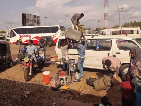 Sudanese fleeing violence arrive in Gadaref, the capital of Sudan's eastern state of Gadaref, on July 3, 2023.  