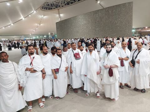 One of the three groups of blind pilgrims.