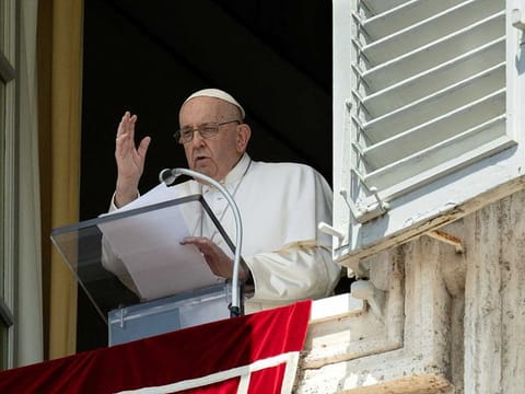 Pope Francis leads the Angelus prayer from his window, at the Vatican, July 9, 2023. 