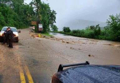 This handout image courtesy of the New York State Police shows heavy flooding and washout on State Route 9W of the Palisades Interstate Parkway in Rockland County, New York, July 9, 2023.