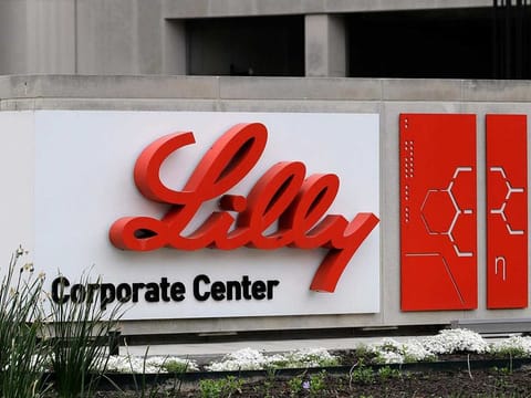 A sign for Eli Lilly & Co. sits outside their corporate headquarters in Indianapolis on April 26, 2017. 