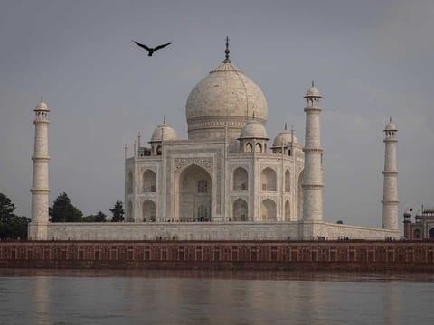 Tourists walk inside the historic Taj Mahal as the Yamuna river overflows following heavy rains, in Agra, India July 18, 2023. 