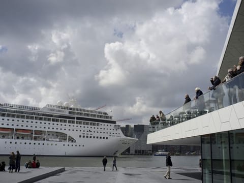 Amsterdam municipality wants to move a cruise liner terminal out of the heart of the historic capital as the latest step in its ongoing battle against pollution and hoards of tourists clogging its narrow, cobbled streets, it was announced Friday.