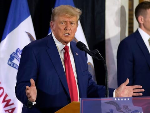Former President Donald Trump speaks to campaign volunteers at the Elks Lodge, Tuesday, July 18, 2023, in Cedar Rapids, Iowa. 
