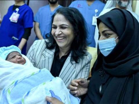 A thankful Hanan, 38, right, with her newborn Suhail Al Kaabi and Dr. Sulsa M. Jain at the  Burjeel Royal Hospital, Al Ain.