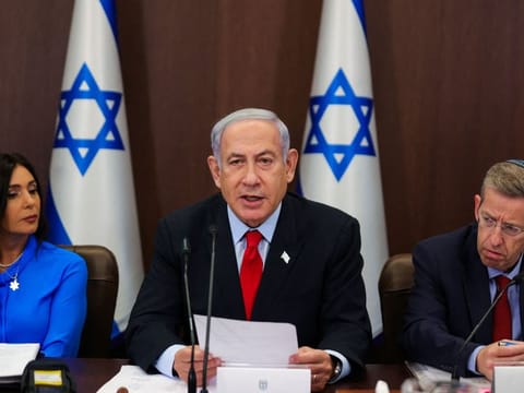 Israel's Prime Minister Benjamin Netanyahu speaks during the weekly cabinet meeting in the prime minister's office in Jerusalem on July 30, 2023.  