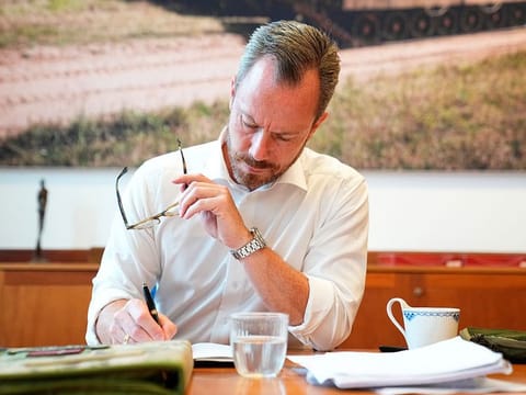 Defense Minister and chairman of Venstre, Denmark's Liberal Party, Jakob Ellemann-Jensen works in his office at the Ministry of Defense in Copenhagen, Denmark, Aug. 1, 2023. 