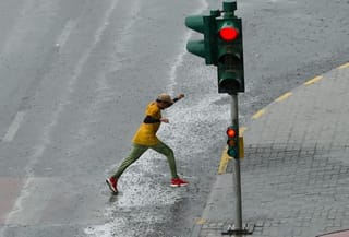 In photos: UAE residents go about their day amid heavy rains in Dubai and Sharjah 