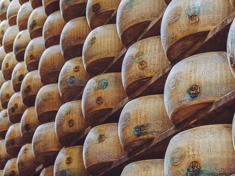 For illustrative purposes only. The man was buried under the cheeses when a shelf broke in his warehouse.