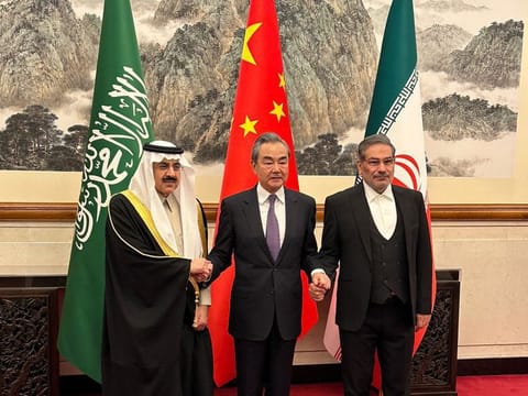 From Left: Saudi national security adviser Musaad bin Mohammad Al Aiban, Wang Yi, China's most senior diplomat and Ali Shamkhani, secretary of Iran’s Supreme National Security Council, in Beijing on March 10. Iran and Saudi Arabia then agreed to restore ties and to reopen respective diplomatic missions after talks in China.