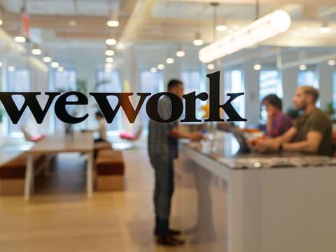 The owner of co-working giant Regus - think WeWork, just posted its best six-month sales period ever.