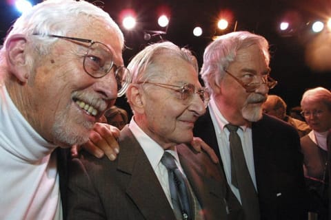 Lore Noto, the original producer of the off-Broadway musical, 'The Fantasticks," is flanked by the play's authors, Tom Jones, left, and Harvey Schmidt, at the tiny Sullivan Street Playhouse in New York's Greenwich Village, earlier this year.