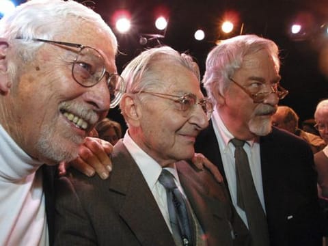 Lore Noto, the original producer of the off-Broadway musical, 'The Fantasticks," is flanked by the play's authors, Tom Jones, left, and Harvey Schmidt, at the tiny Sullivan Street Playhouse in New York's Greenwich Village, earlier this year.