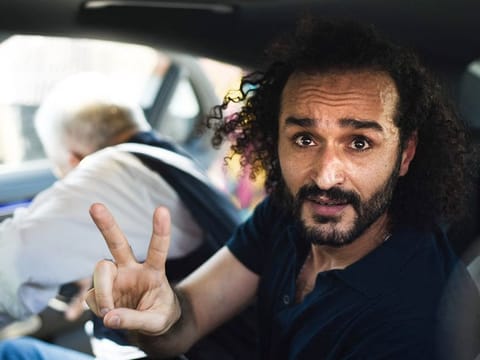 Egyptian activist Ahmed Douma gestures following his release from prison on August 19, 2023. 