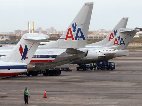 American Airlines aircraft sit on the tarmac at LaGuardia airport following a reservation system outage in New York, April 16, 2013. 