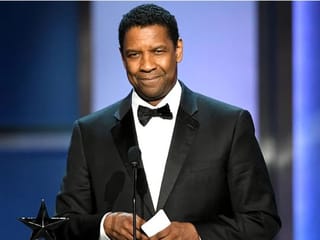 Hollywood star Denzel Washington is like a dad to Dakota Fanning