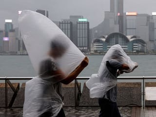 In Photos: Hong Kong issues highest level alert for Super Typhoon Saola