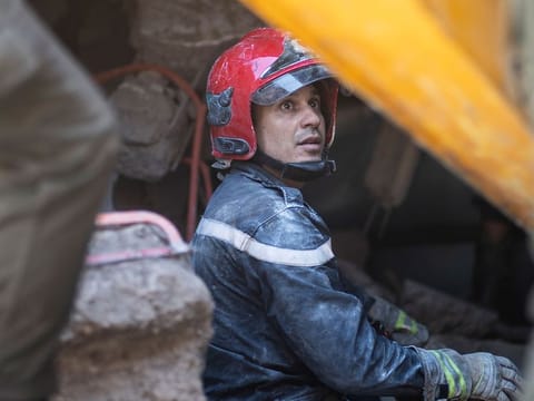 A worker takes part in a rescue operation after the earthquake in Moulay Ibrahim village, near Marrakech, Morocco.
