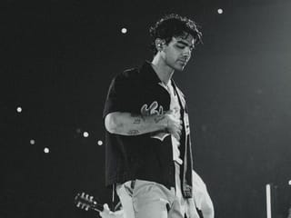 Singer Joe Jonas sheds a tear onstage for his wife and Hollywood star Sophie Turner