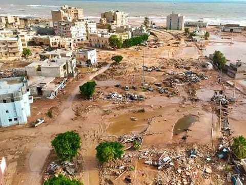 This handout picture released on the account of the Libyan Red Crescent on the X (formerly Twitter) platform on September 13, 2023, shows a general view of destruction in the wake of floods after the Mediterranean storm "Daniel" hit Libya's eastern city of Derna.  