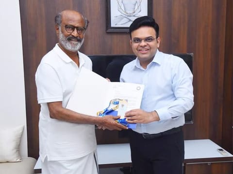 Jay Shah presenting Rajinikanth with the special 'Golden Ticket'.