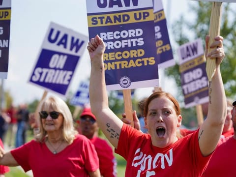 UAW President Shawn Fain has accused auto executives of engaging in a “race to the bottom” in the transition to EVs, with factories that will employ fewer workers making lower wages.
