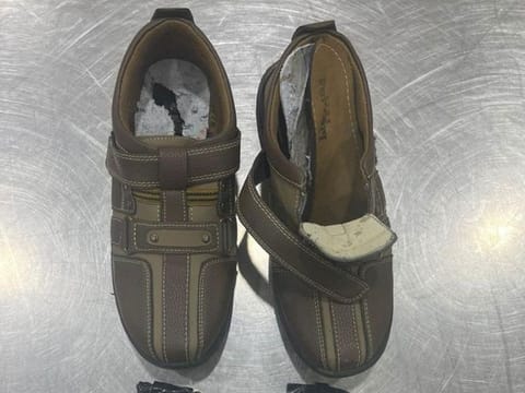 A passenger at Dubai Airports flew in with opium concealed inside his shoes. But Dubai Customs inspectors got the better of him.