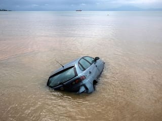 Photos: Flooded homes, streets as another storm hits battered central Greece 