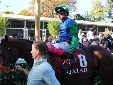 Italian jockey Frankie Dettori riding "Free Wind" arrives to compete in his last race ahead of The Qatar Prix de l'Arc de Triomphe horse race at The Paris Longchamp racecourse in Paris on Sunday.