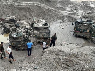 Flash floods kill at least 14 in northeastern India and leave more than 100 missing