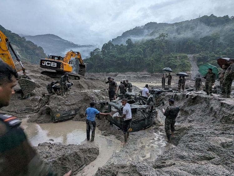 2023-10-05T112354Z_478471456_RC2BM3AEHF5Y_RTRMADP_3_INDIA-FLOODS-(Read-Only)-1696507135710