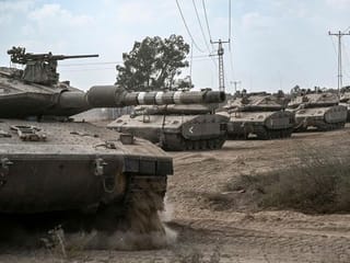 Photos: Israeli soldiers patrol Gaza border as it amasses forces for ground siege