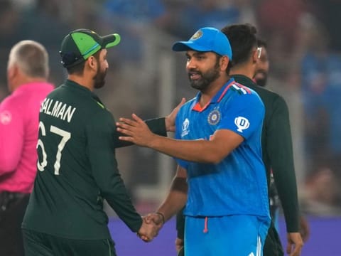 India's captain Rohit Sharma greets with Pakistan's Salman Agha following India's win in the World Cup match in Ahmedabad, India on Saturday.