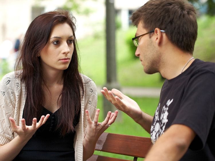 Two people fighting