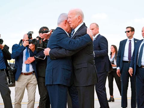 US President Joe Biden hugs Israel Prime Minister Benjamin Netanyahu upon his arrival at Tel Aviv’s Ben Gurion airport amid the ongoing battles between Israel and the Hamas