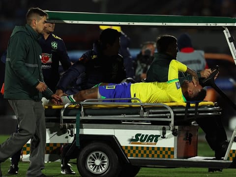Brazil's forward Neymar leaves the field after an injury during the 2026 FIFA World Cup South American qualification football match between Uruguay and Brazil