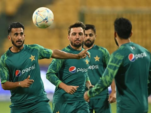Pakistan's Hasan Ali plays football during a practice session on the eve of the Cricket World Cup match against Australia at the M Chinnaswamy Stadium in Bengaluru on Thursday.