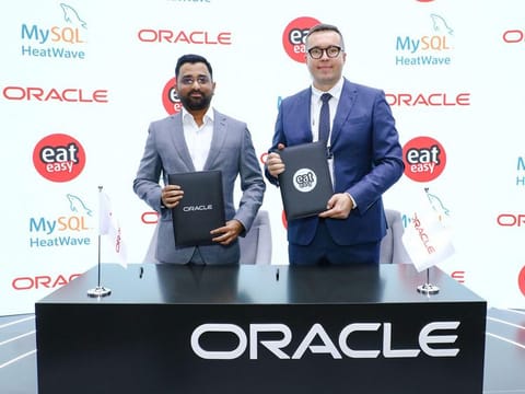 From Left to Right - Safarath Shafi, founder & CEO of EatEasy with Przemek Dominiak, Senior Director MySQL Heatwave