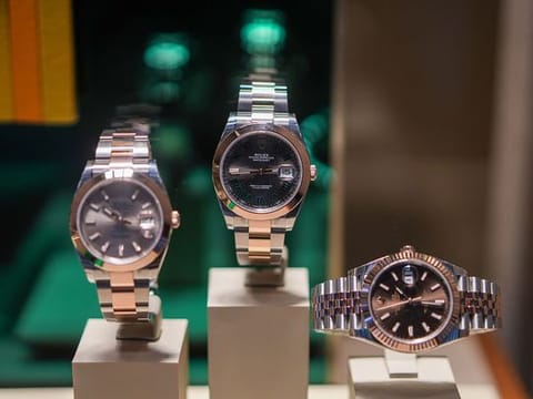 Luxury Datejust watches, manufactured by Rolex SA, in the window of a Bucherer AG store in Paris, France.  