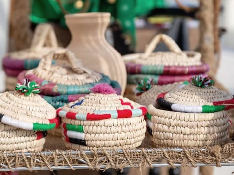 Household wares made from parts of date palm trees are part of local heritage