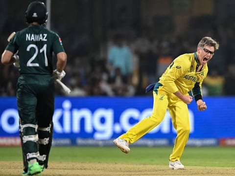 Australia’s Adam Zampa celebrates after taking the wicket of Pakistan’s Mohammad Nawaz during the 2023 ICC Men's Cricket World Cup one-day international (ODI) match at the M. Chinnaswamy Stadium in Bengaluru, India, on October 20, 2023. 