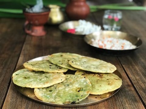 Karaishutir Kochuri or deep fried fluffy bread with spicy green peas filling