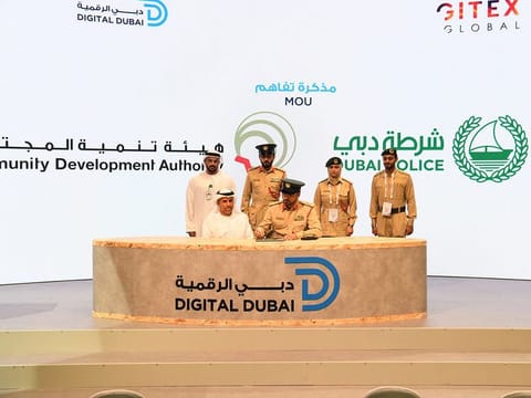 Dubai Police and CDA officials during the MoU signing at Gitex tech show in Dubai