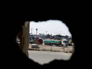 Pictures: Emergency aid trucks enter Gaza